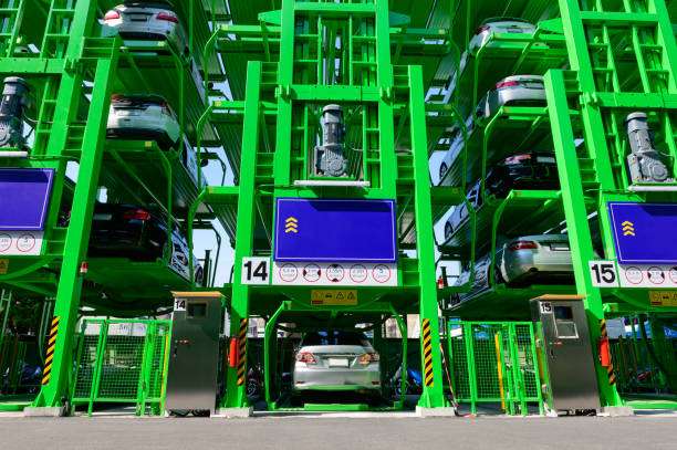 Many cars are parked in automatic multi level open space car parking lot.